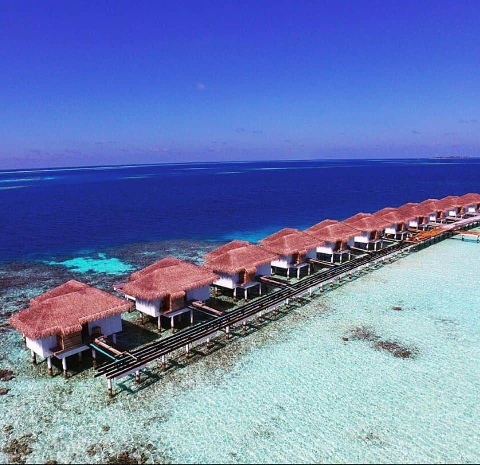 Over water villas in Cocogiri with shades of blue in Maldives.