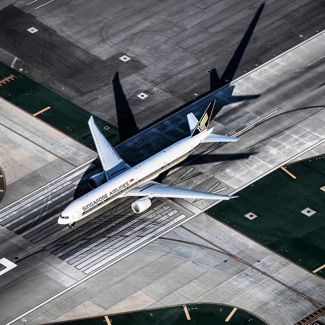 Singapore airlines aircraft on the tarmac of an airport
