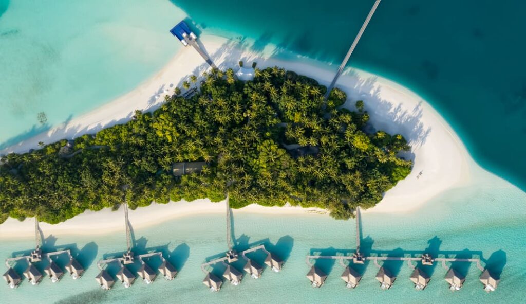 Conrad Maldives with white sandy beaches , over water villas and the first undewater villa