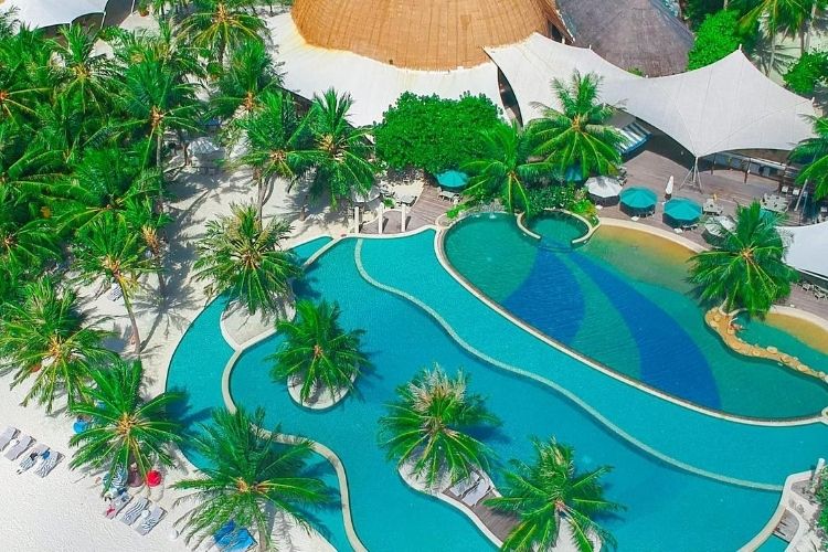 Aerial pool view of Holiday Inn Resort Kandooma Maldives