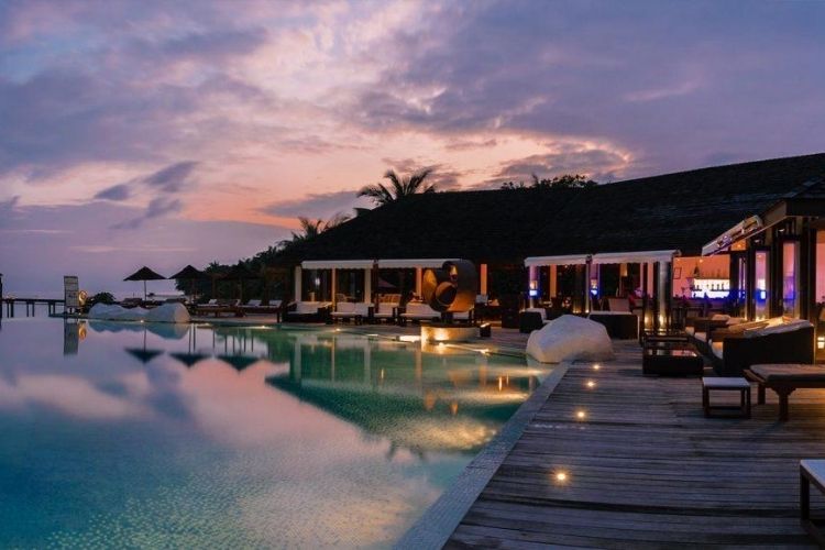Pool and Bar sunset at Maldives Resort