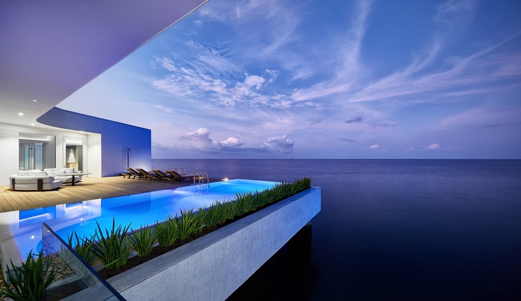 The underwater villas deck at dusk at Conrad Maldives.