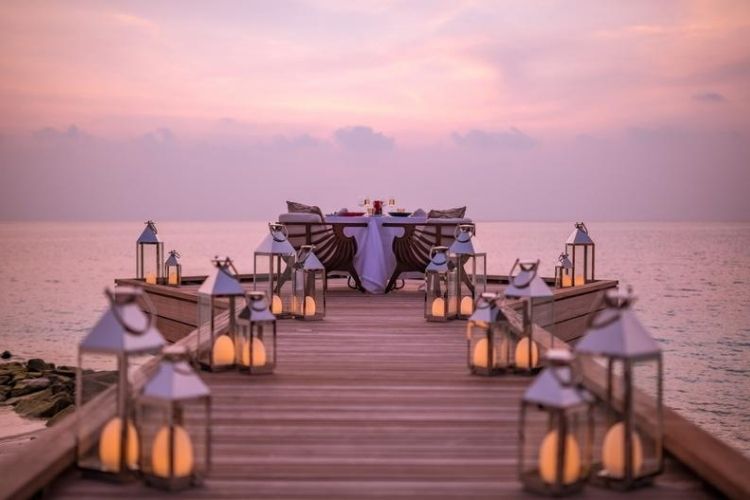 Dinner on deck overlooking the Indian Ocean at LUX* North Male Atoll