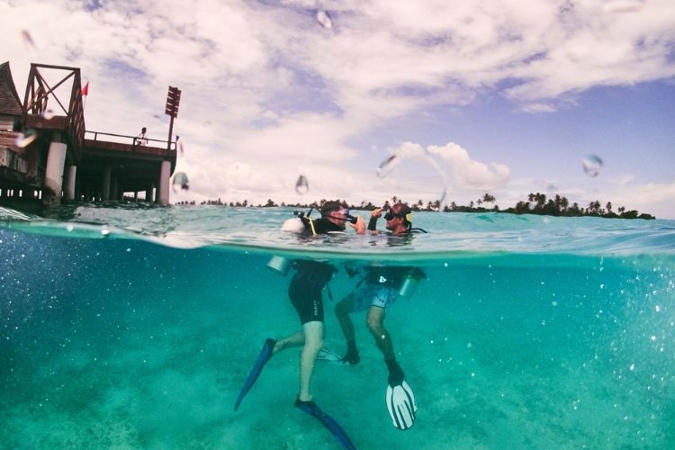 snorkeling at maldives resort sun siyam iru fushi
