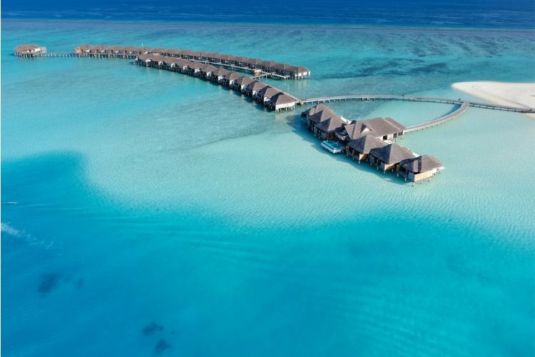 aerial view of overwater villas at velassaru Maldives